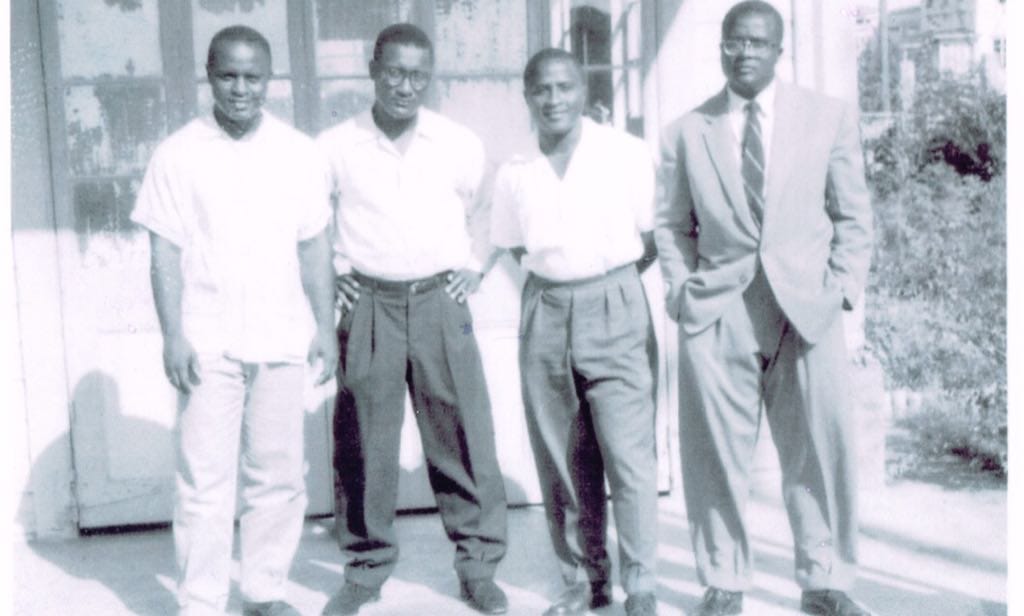 Scratched landscape photo before restoration